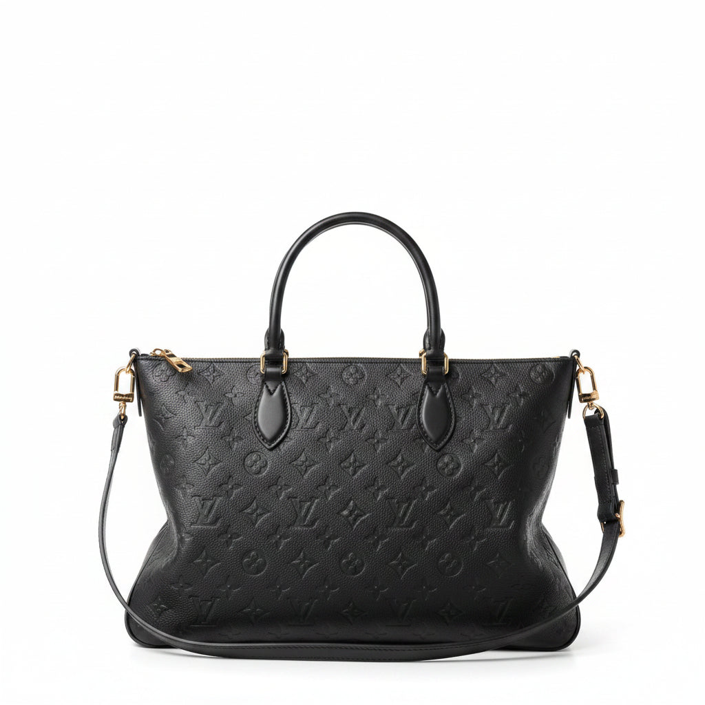 This is a Louis Vuitton OnTheGo GM tote bag in black Monogram Empreinte leather.